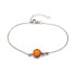 Bracciale con ambra tonda cognac, in argento 925 rodiato, lunghezza 17+ 3 cm