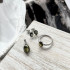 Ring with natural oval green amber from the Baltic Sea, in rhodium-plated silver 925