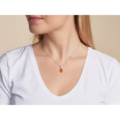 Pendant with oval cognac amber, in 925 rhodium silver, height 1.2+0.8 cm