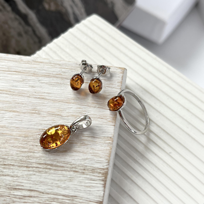 Pendant with oval cognac amber, in 925 rhodium silver, height 1.2+0.8 cm