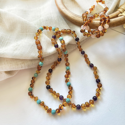 Baby necklace with amber and rose quartz, clip clasp, length 32 - 33 cm