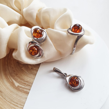 Pendant with round cognac amber, in 925 rhodium silver, height 1+1.2 cm