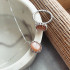 Ring with natural oval pink moonstone, in 925 rhodium silver