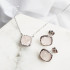 Stud earrings with natural rose quartz, in 925 rhodium silver