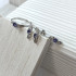 Ring with natural blue tanzanite, in rhodium silver 925