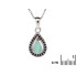 Druppelhanger met smaragd en spinel, in 925 gerhodineerd zilver