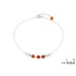 Bracciale con pallina d'ambra cognac, in argento 925 rodiato, lunghezza 23+4 cm
