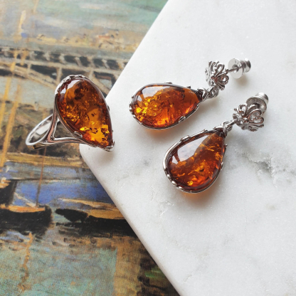 Ring with natural cognac amber from the Baltic Sea, in rhodium-plated silver 925