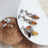 Dangle earrings with natural cognac amber, in 925 rhodium silver