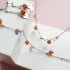 Halsketting met cognac barnsteen, in 925 gerhodineerd zilver, lengte 40 + 5 cm