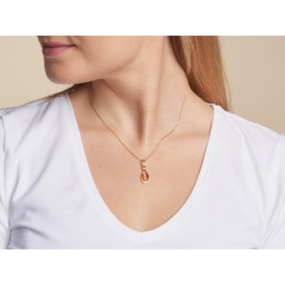 Colgante con ámbar coñac ovalado, en plata dorado 925, altura 2,8 cm
