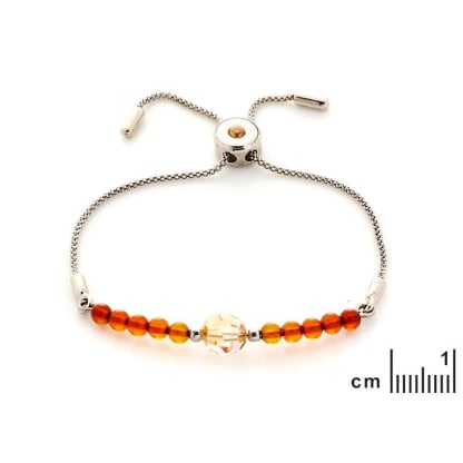 Pulsera con bola de ámbar y cristal de Swarovski, en plata 925 rodiada