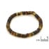 Pulseira com âmbar cilíndrico multicolorido, comprimento 20 cm