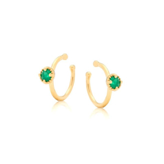 Piercing com ónix verde...