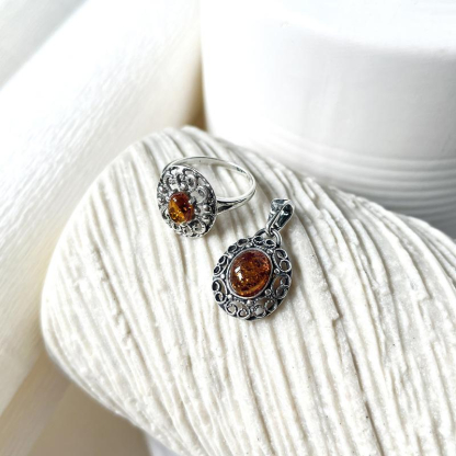 Ring with natural cognac amber from the Baltic Sea, oval, in 925 antique silver