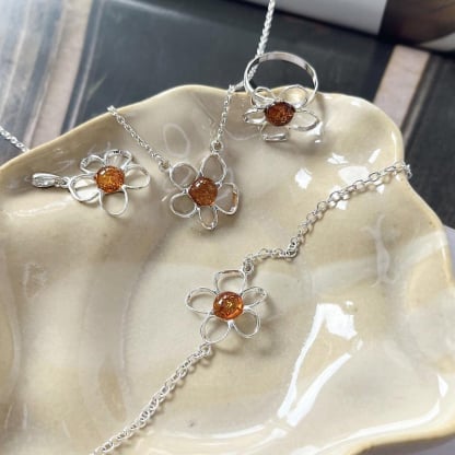 Ring with natural cognac amber from the Baltic Sea, in 925 rhodium-plated silver