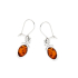 Dangling earrings with oval cognac amber, in rhodium-plated 925 silver