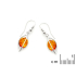 Bungelende oorbellen met ovale cognac-amber, in rhodiumgeplateerd 925 zilver