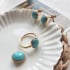 Bague avec turquoise bleue ovale naturelle reconstituée, en argent doré 925