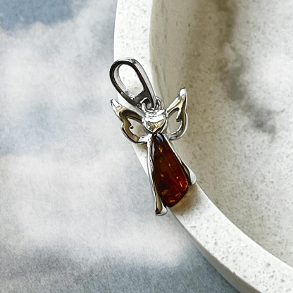 Irregular cognac Baltic amber angel pendant, rhodium-plated 925 silver, 5x12 mm
