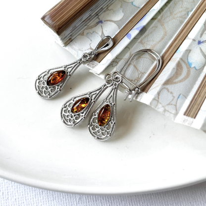 Natural marquise cognac Baltic amber pendant, rhodium-plated 925 silver, 5x10 mm