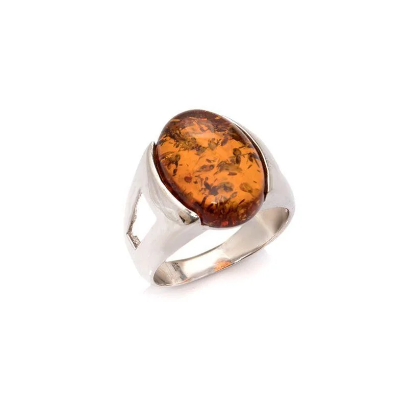 Signet ring with oval Baltic Sea cognac amber, in 925 rhodium-plated silver