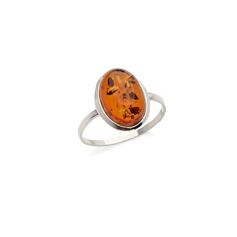 Ring with natural cognac amber from the Baltic Sea oval, in rhodium-plated silver 925