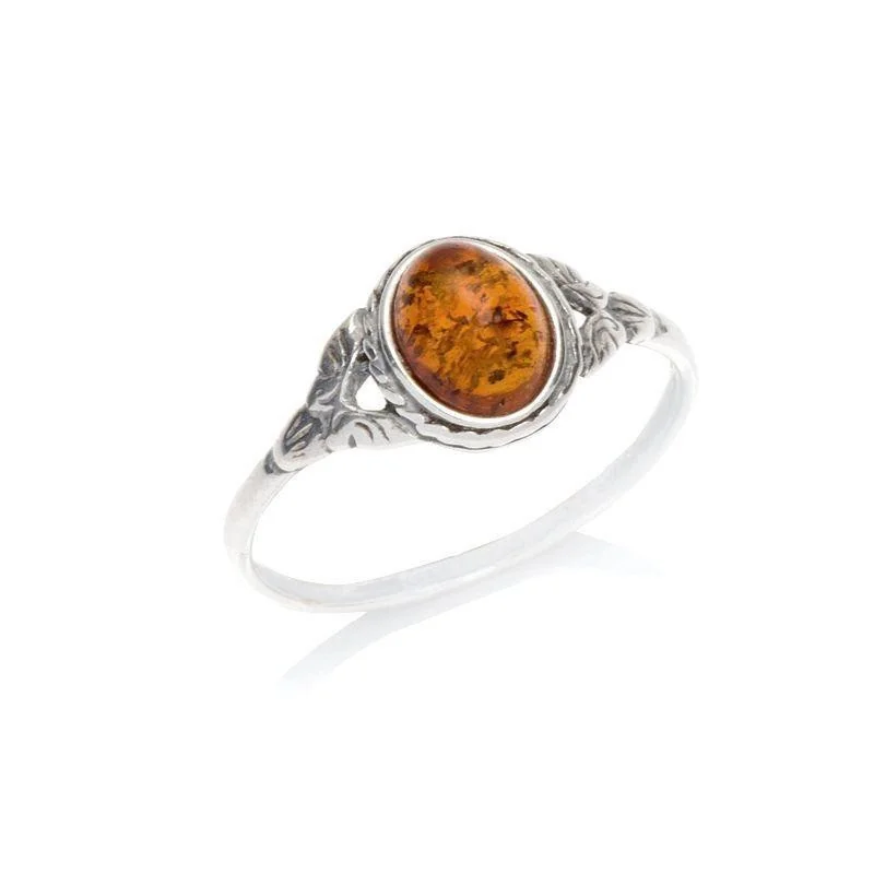 Ring with oval Baltic Sea cognac amber, in 925 antique silver