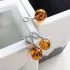 Pendant with cognac amber ball, in rhodium silver 925, height 1+1 cm