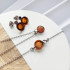 Bracelet with round cognac amber, in 925 rhodium silver, length 17+ 3 cm