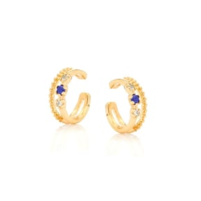 Piercing met natuurlijke blauwe topaas, in 925 goudkleurige zilver