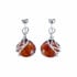 Orecchini con ambra naturale cognac, in argento 925 rodiato