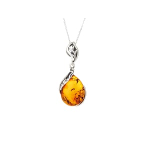 Pendant with natural cognac amber from the Baltic Sea, in rhodium-plated silver 925