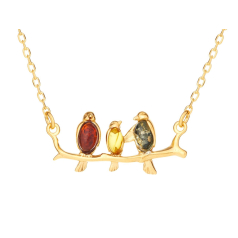 Collier oiseau avec ambre...