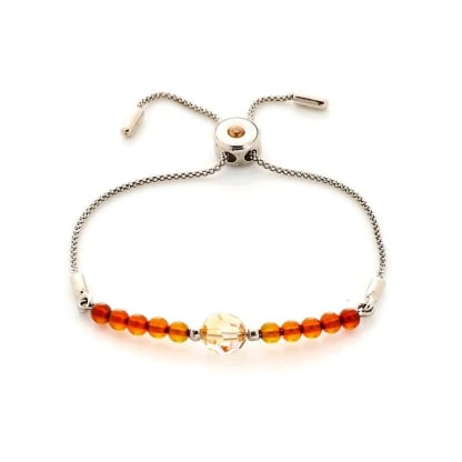 Pulsera con bola de ámbar y cristal de Swarovski, en plata 925 rodiada