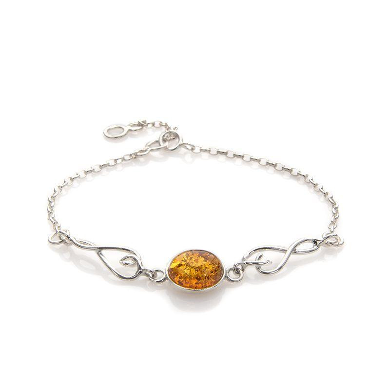 Bracelet with oval cognac amber, in 925 rhodium silver, length 16+3 cm