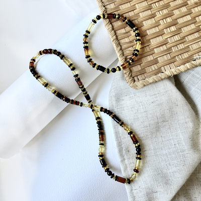 Wholesale jewelry and accessories - Bracelet with cylindrical multi-colored Baltic amber, length 17-18cm