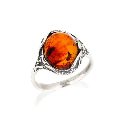 Sale of your Ring with natural cognac amber from the Baltic Sea oval, in aged silver 925/1000 wholesale.