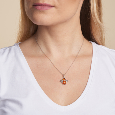 Wholesaler of jewelry and accessories - Bee pendant with cognac amber, in aged rhodium-plated silver 925/1000, height 1.6+0.8 cm