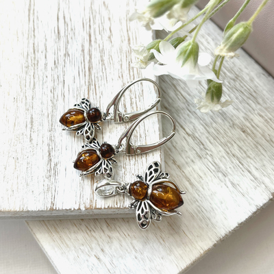 Wholesaler of jewelry and accessories - Bee earrings with natural cognac amber, in 925/1000 gold-plated silver