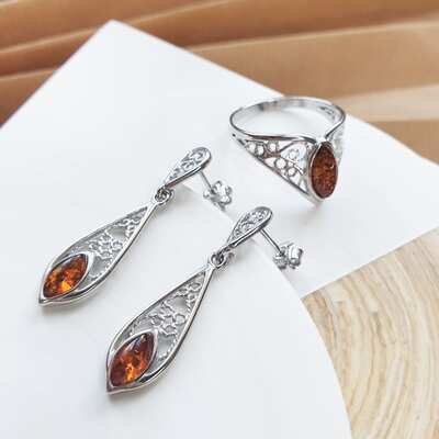 Wholesaler of jewelry and accessories - Dangle earrings with natural cognac amber, in rhodium-plated silver 925/1000