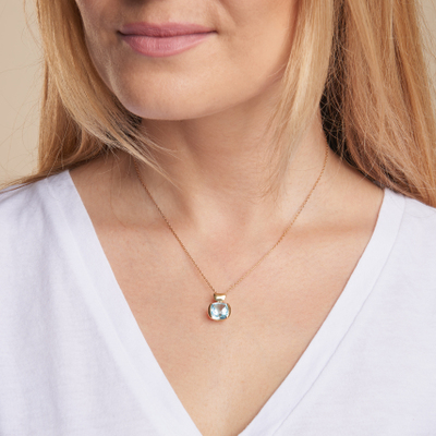 Wholesaler of jewelry and accessories - Pendant with natural blue topaz, in 750/1000 gold